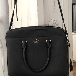 Off to work in style with this Saffiano leather laptop bag.